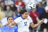 United States defender Emily Sams (12) gets a header in front of Iceland forward Sveindís Jane Jónsdóttir, left, during the first half of an international friendly women's soccer match Sunday, Oct. 27, 2024, in Nashville, Tenn. (AP Photo/John Amis)