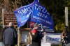 Supporters of Republican presidential nominee former President Donald Trump hold up flags during a Trump rally in Northbrook, Ill., Sunday, Oct. 27, 2024. (AP Photo/Nam Y. Huh)