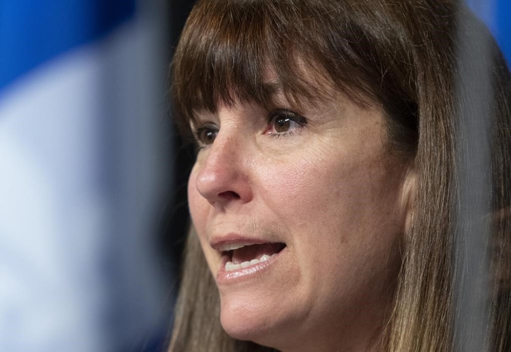 Catherine Lemay, national director of youth protection, speaks at a news conference at the legislature in Quebec City, Wednesday, Dec. 1, 2021. Quebec's national director of youth protection has resigned, days after a media report claimed that educators at a detention centre for youth in Montreal had sexual relations with minor detainees. THE CANADIAN PRESS/Jacques Boissinot