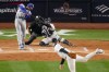 Los Angeles Dodgers' Freddie Freeman hits a two-run home run against the New York Yankees during the first inning in Game 3 of the baseball World Series, Monday, Oct. 28, 2024, in New York. (AP Photo/Frank Franklin II)
