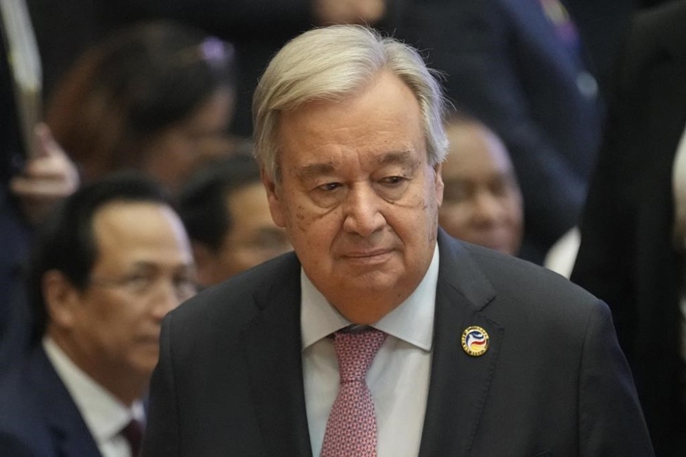 U.N. Secretary-General Antonio Guterres leaves from stage during the 14th ASEAN-U.N. Summit in Vientiane, Laos, Friday, Oct. 11, 2024. (AP Photo/Sakchai Lalit)