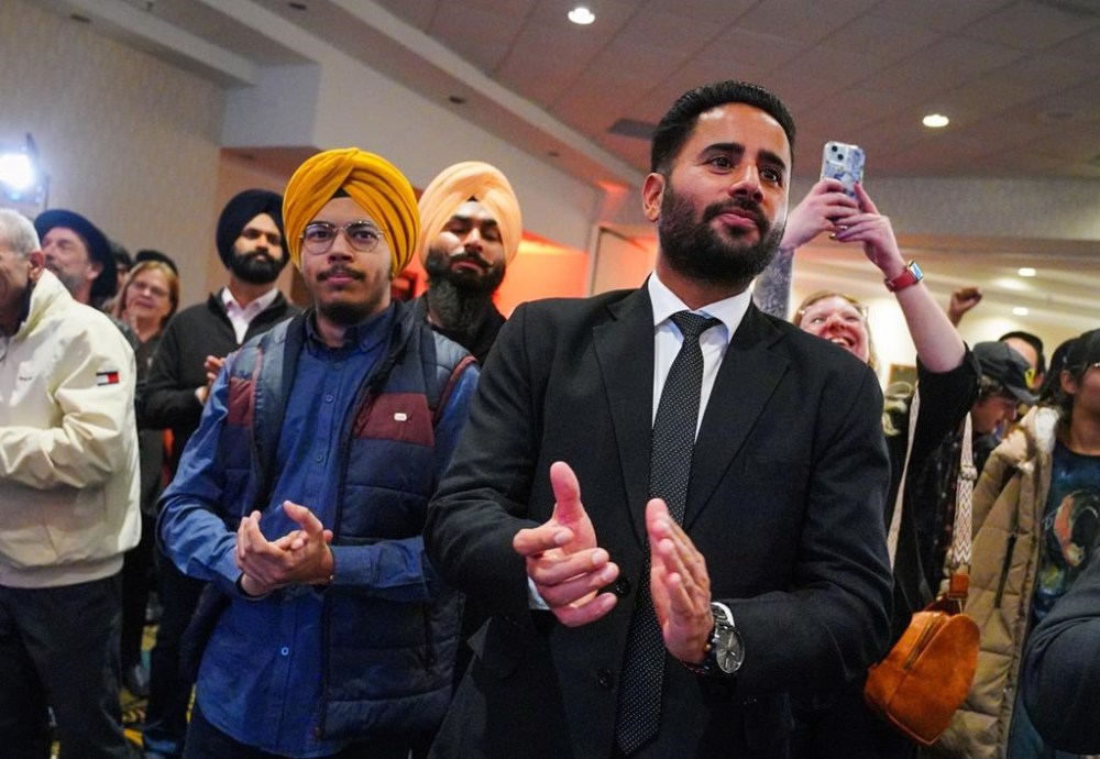 People applaud at Saskatchewan NDP election night headquarters in Regina, Monday, Oct. 28, 2024. THE CANADIAN PRESS/Heywood Yu