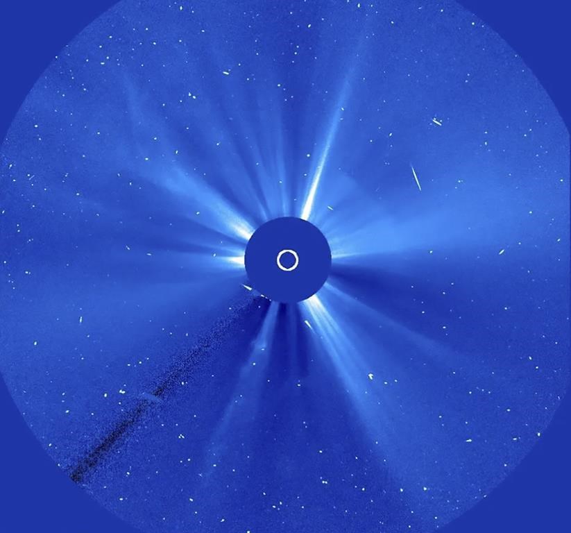 This image provided by NASA shows Comet Atlas, nicknamed the “Halloween comet”, approaching its closest to the sun, October 2024, as seen in this real-time image from NASA’s orbiting Solar and Heliospheric Observatory. (NASA via AP)