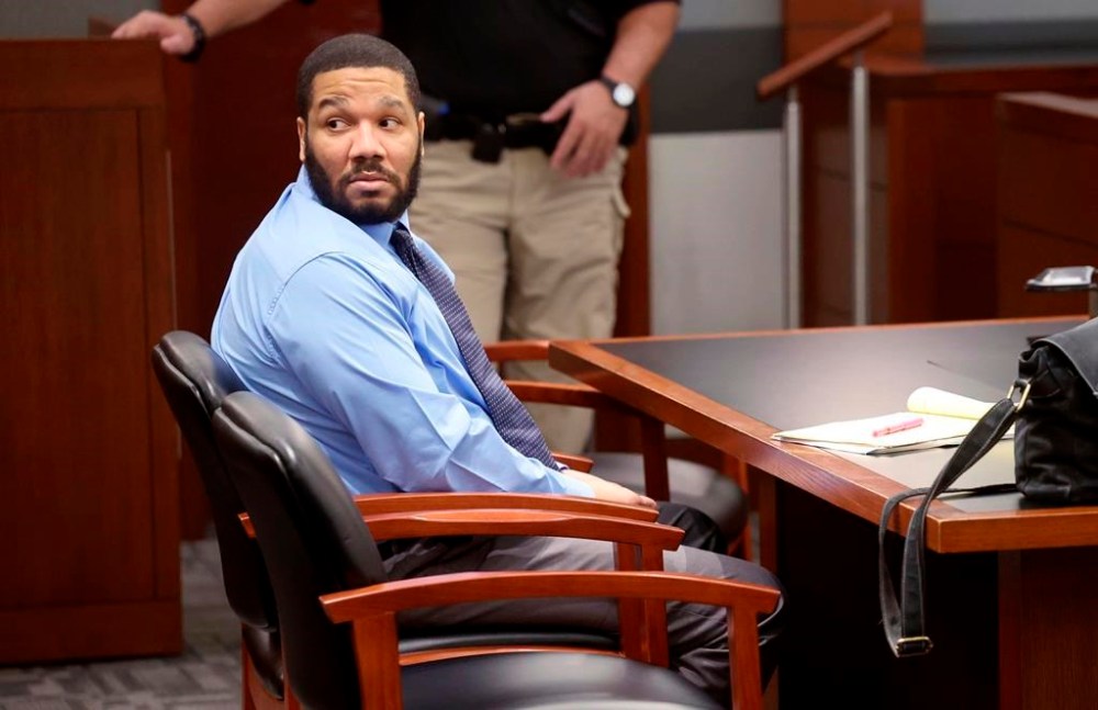Defendant Julius Trotter, a previously convicted felon who is charged with breaking into a room at a Las Vegas Strip hotel-casino and robbing and killing two Vietnamese tour leaders in June 2018, waits in the courtroom for the verdict in his murder trial, Tuesday, Oct. 29, 2024, at the Regional Justice Center in Las Vegas. (K.M. Cannon/Las Vegas Review-Journal via AP)