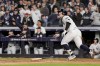 New York Yankees' Anthony Volpe celebrates his grand slam home run against the Los Angeles Dodgers during the third inning in Game 4 of the baseball World Series, Tuesday, Oct. 29, 2024, in New York. (AP Photo/Ashley Landis)