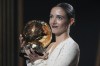 Barcelona's Aitana Bonmati, receives the 2024 Women's Ballon d'Or award during the 68th Ballon d'Or (Golden Ball) award ceremony at Theatre du Chatelet in Paris, Monday, Oct. 28, 2024. (AP Photo/Michel Euler)