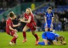Wales' Ceri Holland, center, celebrates scoring their side's second goal of the game against Slovakia during the second leg of a Euro 2025 qualifying playoff soccer match, Tuesday, Oct. 29, 2024, at Cardiff City Stadium in Cardiff, Wales. (Nick Potts/PA via AP)