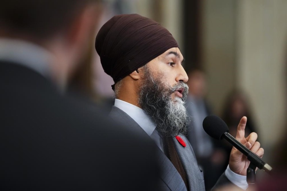 NDP Leader Jagmeet Singh speaks to reporters in the foyer of the House of Commons on Parliament Hill in Ottawa, Wednesday, Oct. 30, 2023. THE CANADIAN PRESS/Sean Kilpatrick