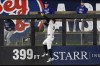 New York Yankees center fielder Aaron Judge catches a fly ball by Los Angeles Dodgers' Freddie Freeman during the fourth inning in Game 5 of the baseball World Series, Wednesday, Oct. 30, 2024, in New York. (AP Photo/Seth Wenig)