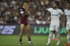Walter Bou of Argentina's Lanus, left, reacts after missing a chance to score against Brazil's Cruzeiro during a Copa Sudamericana semifinal second leg soccer match at La Fortaleza Stadium in Buenos Aires, Argentina, Wednesday, Oct. 30, 2024. (AP Photo/Gustavo Garello)