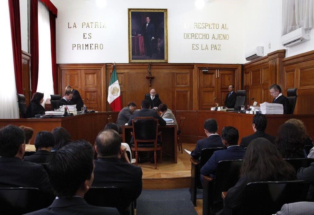 FILE - Supreme Court Justices, from left, Norma Lucia Pina, Jorge Mario Pardo, Jose Ramon Cossio and Arturo Zaldivar meet at the Supreme Court in Mexico City, Sept. 7, 2016. (AP Photo/Marco Ugarte,File)
