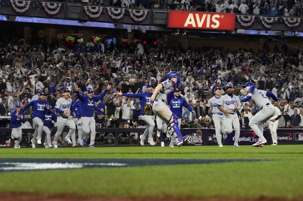 The Los Angeles Dodgers celebrate their win against the New York Yankees in Game 5 to win the baseball World Series, Wednesday, Oct. 30, 2024, in New York. (AP Photo/Godofredo A. Vásquez)