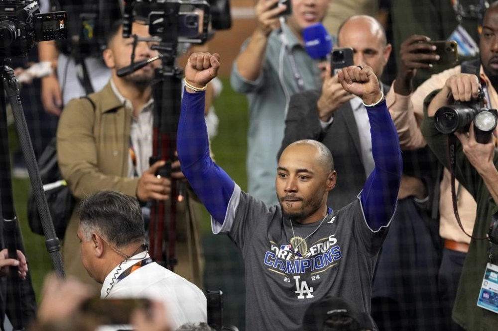 Los Angeles Dodgers' Mookie Betts celebrates after the Dodgers beat the New York Yankees in Game 5 to win the baseball World Series, Thursday, Oct. 31, 2024, in New York. (AP Photo/Seth Wenig)