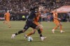 Forge FC midfielder Kyle Bekker (right) and Cavalry FC forward Ali Musse (7) battle for the ball during first half Canadian Premier League finals soccer action in Hamilton on Saturday, Oct. 28, 2023. THE CANADIAN PRESS/Nick Iwanyshyn