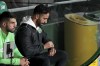 Sporting's head coach Ruben Amorim, who Manchester United has expressed an interest in hiring, checks his watch during a Portuguese League Cup soccer match between Sporting CP and Nacional at the Alvalade stadium in Lisbon, Tuesday, Oct. 29, 2024. (AP Photo/Ana Brigida)