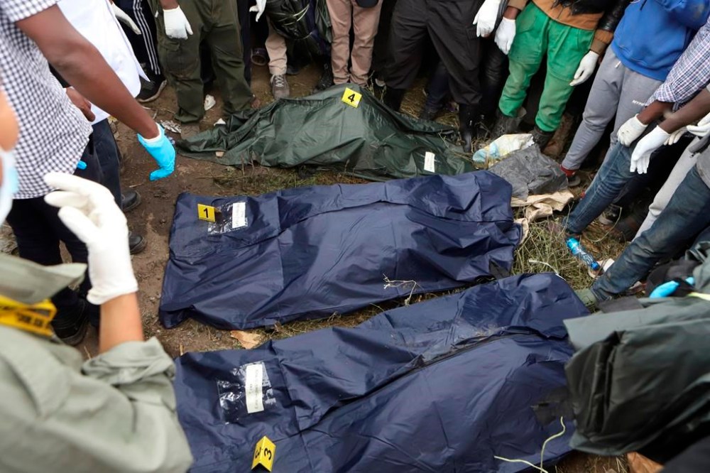 FILE - Sacks with human remains are seen after being removed from a quarry in Mukuru Kwa Njenga area in Nairobi, Kenya Saturday, July 13, 2024. (AP Photo/Andrew Kasuku, File)