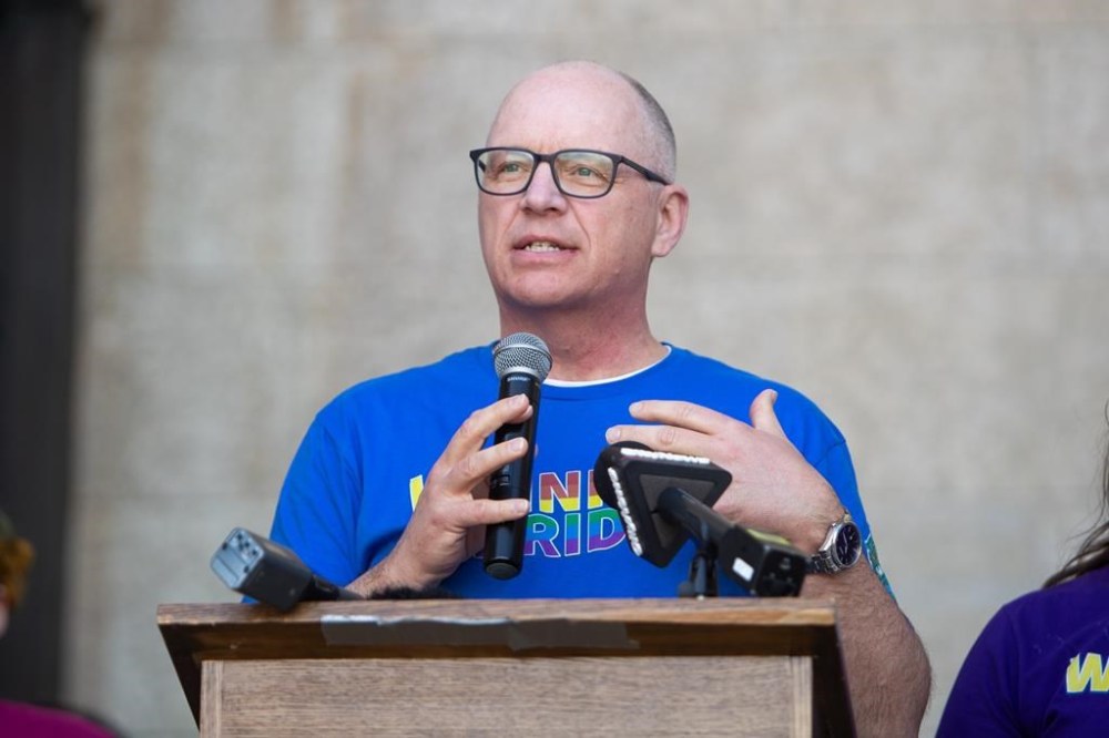 Winnipeg city hall is gauging the public's appetite for potential new taxes on alcohol, online deliveries, vehicle registration and other items. Winnipeg Mayor Scott Gillingham speaks at a rally prior to the 2024 Winnipeg Pride Parade, on Sunday, June 2, 2024. THE CANADIAN PRESS/Daniel Crump