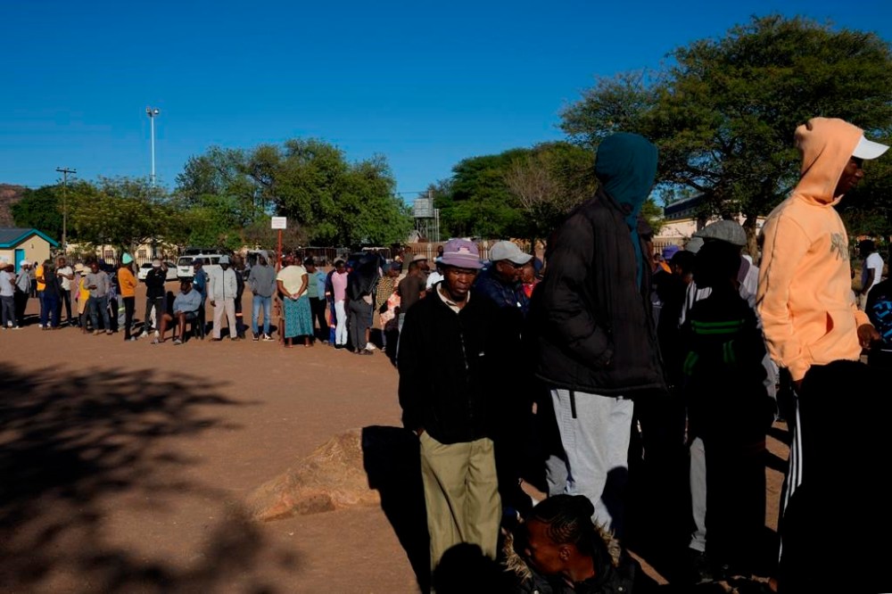 Residents await their turns to cast their votes during an election to decide if it keeps faith with one of the Africa's longest-ruling parties, in Gaborone, Botswana, Wednesday, Oct. 30, 2024. (AP Photo/Themba Hadebe)