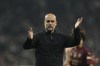 Manchester City's head coach Pep Guardiola reacts at the end of the English League Cup fourth round soccer match between Tottenham and Manchester City, at the Tottenham Hotspur Stadium in London, Wednesday, Oct 30, 2024. (AP Photo/Ian Walton)