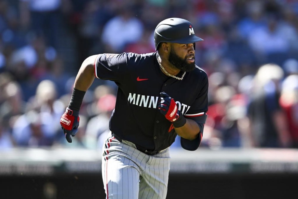 FILE - Minnesota Twins' Manuel Margot runs out a two-run double during the fifth inning of a baseball game against the Cleveland Guardians, Thursday, Sept. 19, 2024, in Cleveland. (AP Photo/Nick Cammett, File)