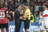 Leverkusen head coach Xabi Alonso, left, talks with referee Daniel Siebert during the German Bundesliga soccer match between Bayer Leverkusen and VfB Stuttgart at the BayArena in Leverkusen, Germany, Friday, Nov. 1, 2024. (AP Photo/Martin Meissner)