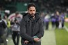 Sporting's head coach Ruben Amorim puts on his coach armband before a Portuguese league soccer match between Sporting CP and Estrela da Amadora at the Alvalade stadium in Lisbon, Friday, Nov. 1, 2024. (AP Photo/Armando Franca)