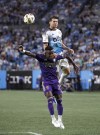 Charlotte FC's Brandt Bronico, back, leaps over Orlando City defender Dagur Thorhallsson for the header during the first half of game 2 of an MLS Cup soccer playoff game, Friday Nov. 1, 2024 in Charlotte, N.C. (Jonathan Aguallo/The Charlotte Observer via AP)