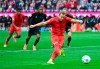 Bayern's Harry Kane shoots to score from the penalty spot during the Bundesliga soccer match between Bayern Munich and Union Berlin at the Allianz Arena in Munich, Germany, Saturday, Nov. 2, 2024. (Sven Hoppe/dpa via AP)