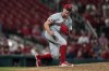 FILE - Cincinnati Reds relief pitcher Emilio Pagan celebrates after striking out St. Louis Cardinals' Matt Carpenter with the bases loaded to end a baseball game Tuesday, Sept. 10, 2024, in St. Louis. (AP Photo/Jeff Roberson, File)