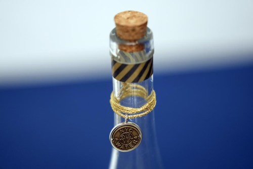 FILE - A bottle containing NYC tap water is displayed at a news conference about repairs occurring to the water supply infrastructure in New York, Sept. 30, 2024. (AP Photo/Seth Wenig, File)