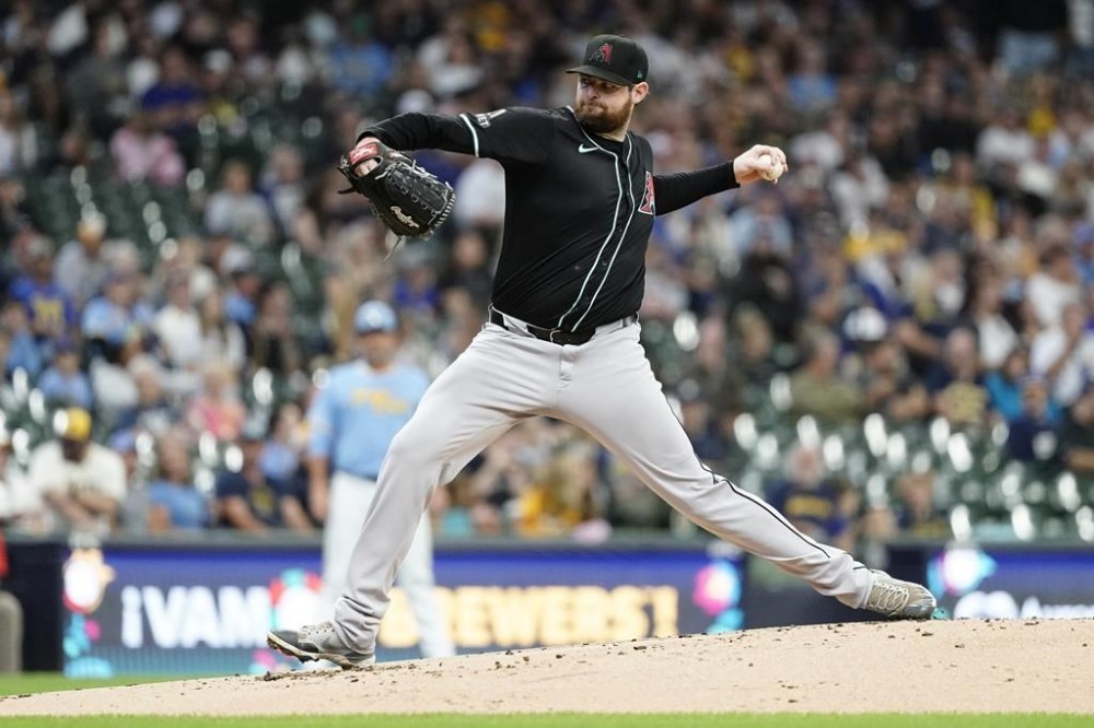 FILE - Arizona Diamondbacks' Jordan Montgomery pitches during the first inning of a baseball game against the Milwaukee Brewers, Sept. 22, 2024, in Milwaukee. (AP Photo/Aaron Gash, File)