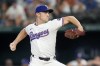 FILE - Texas Rangers relief pitcher David Robertson throws to the Pittsburgh Pirates in the eighth inning of a baseball game, Aug. 21, 2024, in Arlington, Texas. (AP Photo/Tony Gutierrez, File)