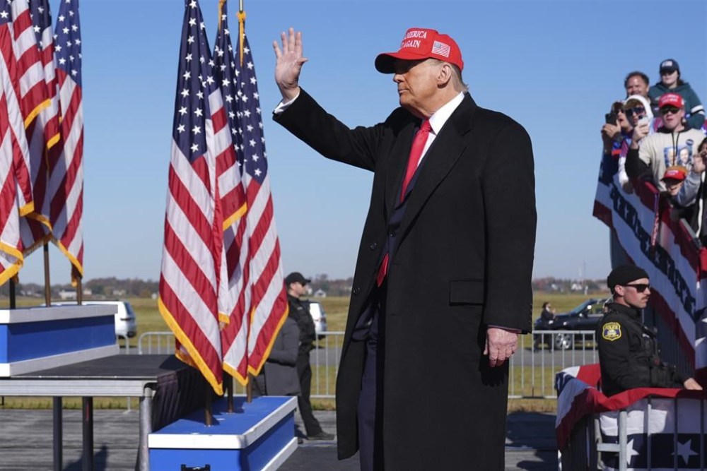 Republican presidential nominee former President Donald Trump waves at a campaign rally in Lititz, Pa., Sunday, Nov. 3, 2024. (AP Photo/Evan Vucci)