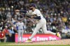 FILE - Milwaukee Brewers' Devin Williams pitches during the ninth inning of a baseball game against the New York Mets, Sept. 28, 2024, in Milwaukee. (AP Photo/Aaron Gash, File)