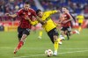 New York Red Bulls defender Sean Nealis, left, fights for the ball against Columbus Crew forward Cucho Hernandez (9) during Game 2 in the first round of the MLS Cup soccer playoffs, Sunday, Nov. 3, 2024, in Harrison, N.J. (AP Photo/Eduardo Munoz Alvarez)
