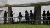 Miami-Dade residents wait in line to vote at the Joseph Caleb Center during the 