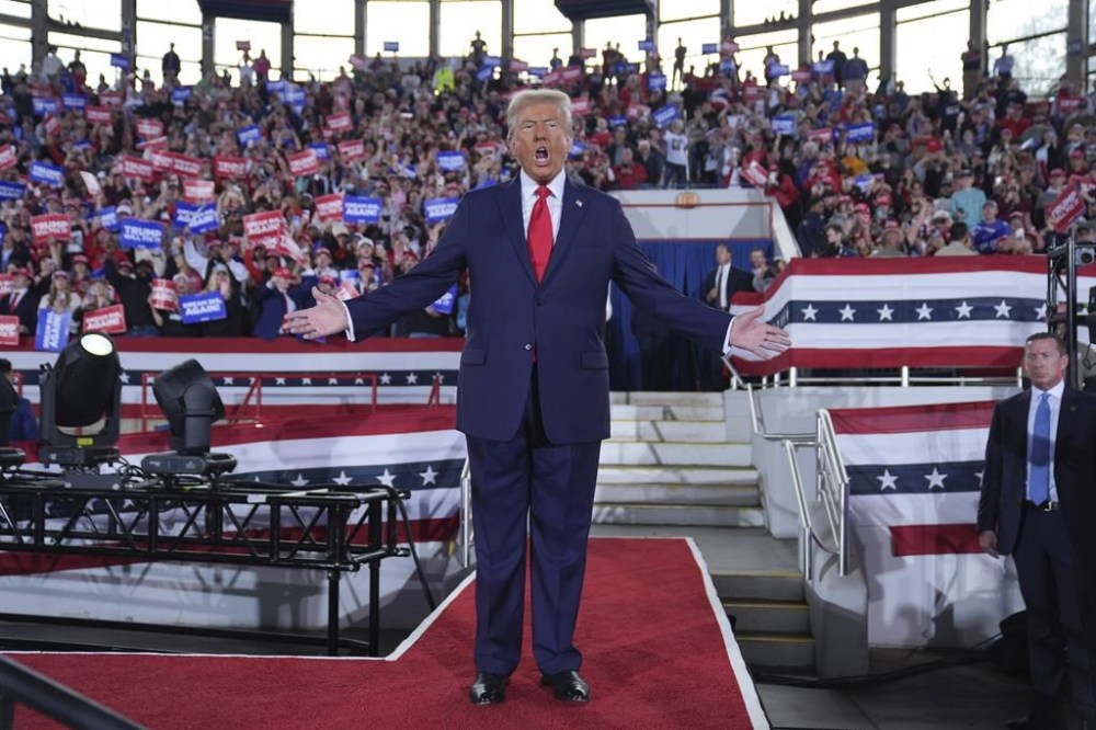 Republican presidential nominee former President Donald Trump arrives to speak at a campaign rally at J.S. Dorton Arena, Monday, Nov. 4, 2024, in Raleigh, N.C. (AP Photo/Evan Vucci)