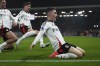 Fulham's Harry Wilson celebrates after scoring his sides second goal during the English Premier League soccer match between Fulham and Brentford at Craven Cottage stadium in London, Monday, Nov. 4, 2024. (AP Photo/Frank Augstein)