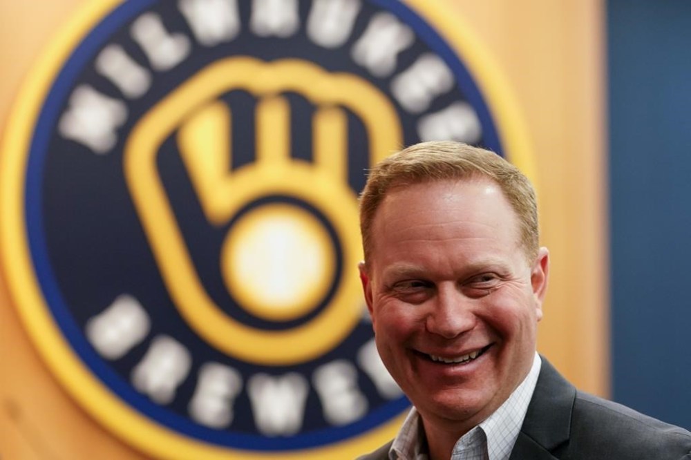 FILE - Milwaukee Brewers new president of baseball operations Matt Arnold smiles at a news conference Thursday, Oct. 27, 2022, in Milwaukee. (AP Photo/Morry Gash, File)