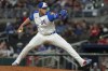 FILE - Atlanta Braves pitcher Joe Jiménez throws in the eighth inning of a baseball game against the Kansas City Royals, Sept. 28, 2024, in Atlanta. (AP Photo/Jason Allen, File)