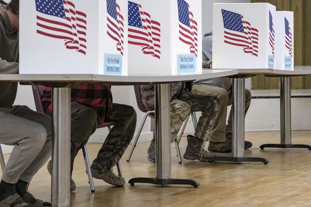 Voters fill out their ballots Hilton Township Hall in Conroy, Iowa on Tuesday, Nov. 5, 2024. (Nick Rohlman/The Gazette via AP)