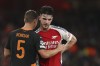 Shakhtar's Valeriy Bondar, left, hugs Arsenal's Declan Rice at the end of the Champions League opening phase soccer match between Arsenal and Shakhtar Donetsk, at the Emirates Stadium in London, Tuesday, Oct. 22, 2024. (AP Photo/Ian Walton)