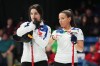Italy's Stefania Constantini, left, and Giulia Zardini Lacedelli discuss shot options during World Women’s Curling Championship action against Sweden in Sydney, N.S. on Sunday, March 17, 2024. THE CANADIAN PRESS/Darren Calabrese