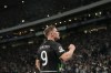 Sporting's Viktor Gyoekeres celebrates after scoring during the UEFA Champions League opening phase match between Sporting and Manchester City in Lisbon, Portugal, Tuesday, November 5, 2024. (AP Photo/Armando Franca)