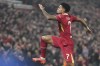 Liverpool's Luis Diaz celebrates after scoring his side's opening goal during the Champions League opening phase soccer match between Liverpool and Bayer Leverkusen at Anfield in Liverpool, England, Tuesday, Nov. 5, 2024. (AP Photo/Jon Super)