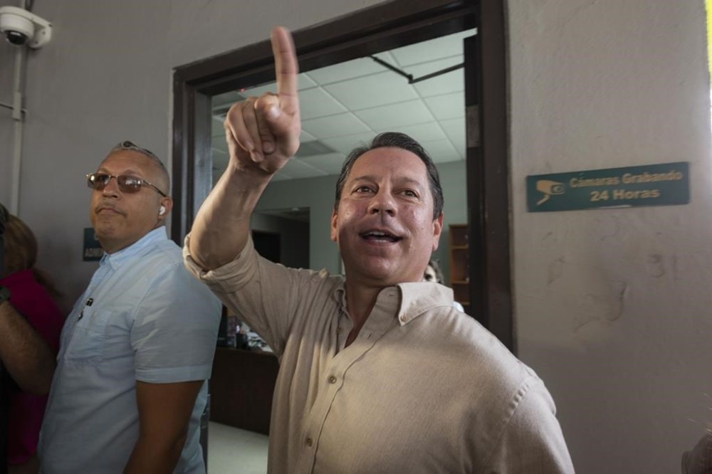 Juan Dalmau, Puerto Rico's Independence Party candidate for Governor, arrives to a polling station to vote in general elections in San Juan, Puerto Rico, Tuesday, Nov. 5, 2024. (AP Photo/Alejandro Granadillo)