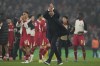 Liverpool's manager Arne Slot applauds the crowd at the end of the Champions League opening phase soccer match between Liverpool and Bayer Leverkusen at Anfield in Liverpool, England, Tuesday, Nov. 5, 2024. (AP Photo/Jon Super)