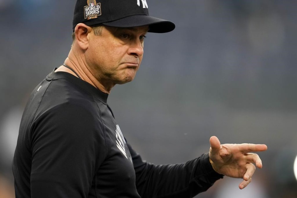 New York Yankees manager Aaron Boone watches during batting practice before Game 5 of the baseball World Series against the Los Angeles Dodgers, Wednesday, Oct. 30, 2024, in New York. (AP Photo/Ashley Landis)