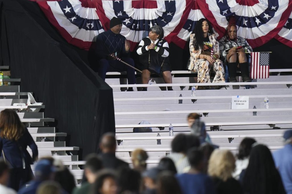 Supporters sit in the bleachers as people leave an election night campaign watch party for Democratic presidential nominee Vice President Kamala Harris after it was announced that she would not speak on Wednesday, Nov. 6, 2024, on the campus of Howard University in Washington. (AP Photo/Stephanie Scarbrough)