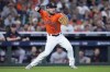FILE - Houston Astros third baseman Alex Bregman throws to second after fielding a bunt by Detroit Tigers' Parker Meadows in the ninth inning of Game 2 of an AL Wild Card Series baseball game Wednesday, Oct. 2, 2024, in Houston. (AP Photo/Kevin M. Cox, File)